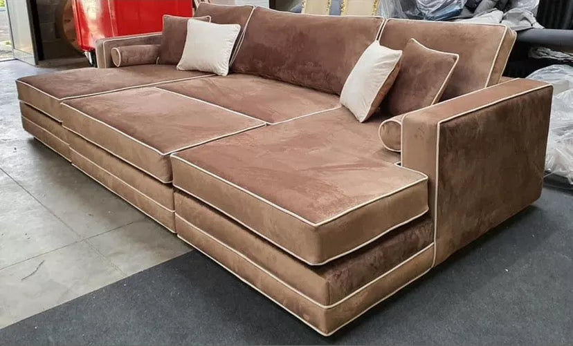 Zara cinema sofa with contrast piping and pull out footstool